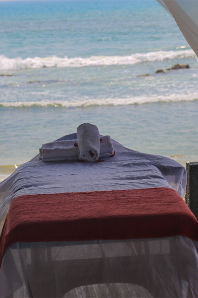 Moonga massage setting prepared by the sea
